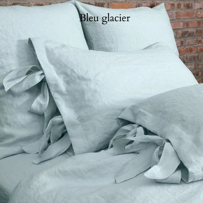 Taies d'oreiller en lin lavé à nœuds #colour_bleu-glacier