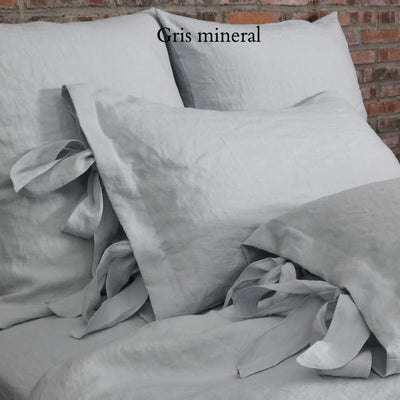 Taies d'oreiller en lin lavé à nœuds #colour_gris-mineral