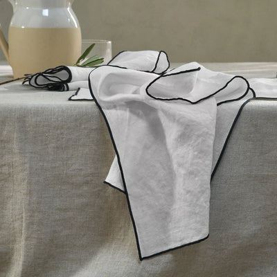 serviettes de table bordées en lin gris minéral