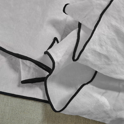 serviettes de table bordées gris minéral en lin lavé 