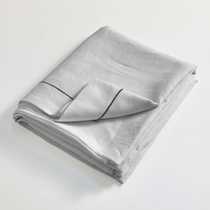 Drap plat en lin lavé Gris Minéral finition bordure Bourdon