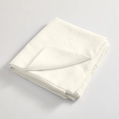 drap plat en lin lavé plié blanc