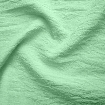 Swatch pour serviettes de table bordées vert menthe